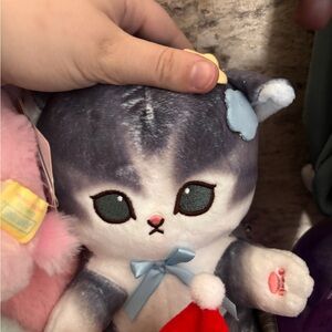 Cute Plush Cat Toy with Blue Bow